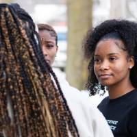 students stand outside